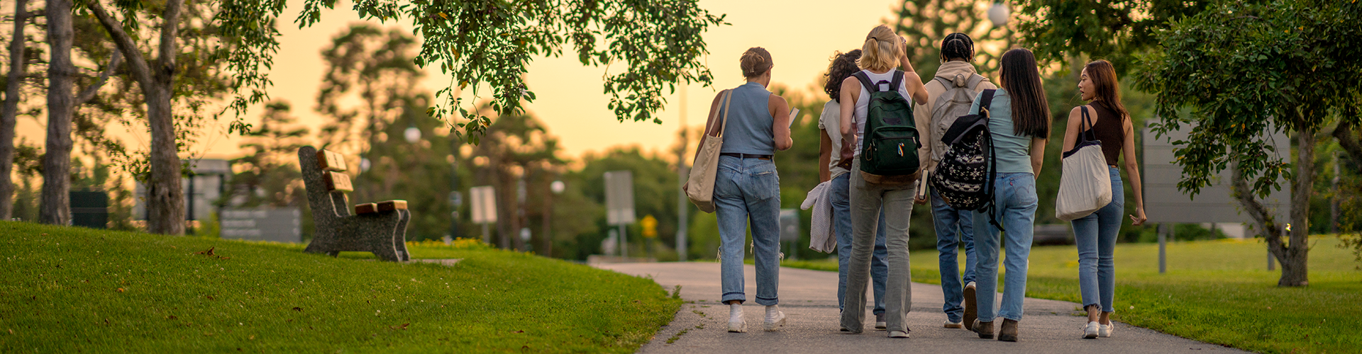 Students walking sunset