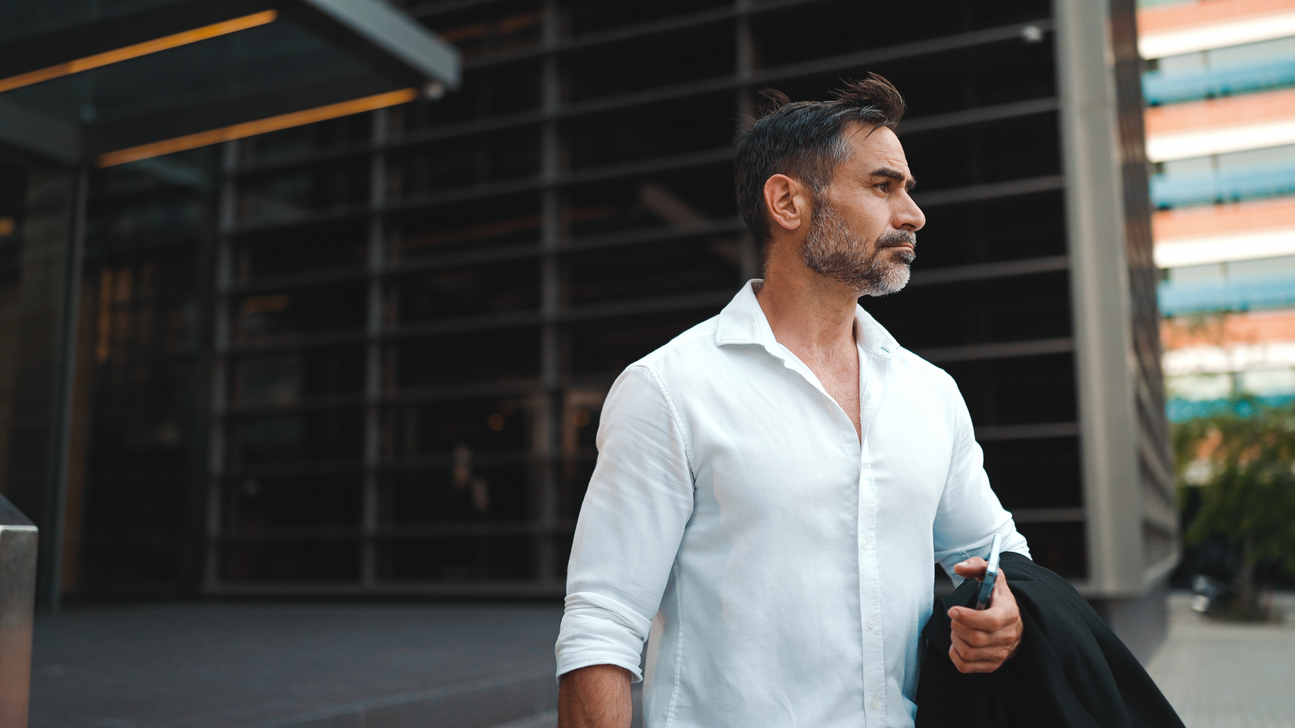 Mature Businessman looking off to the right