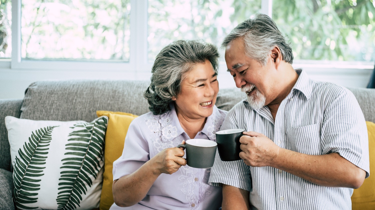 Senior man and senior woman with coffee
